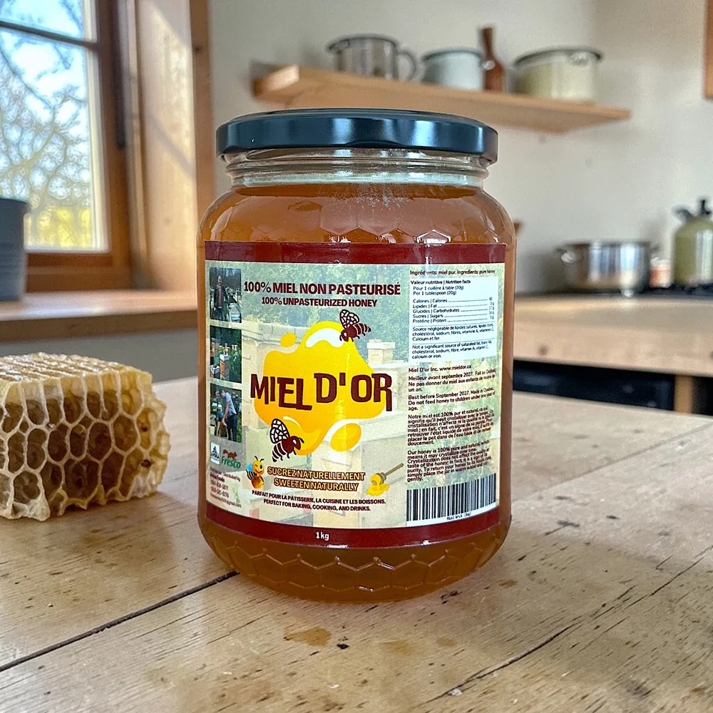 Jar of raw Miel D'or honey